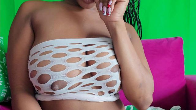 Ebony Babe Spreads Legs in Fishnet Top