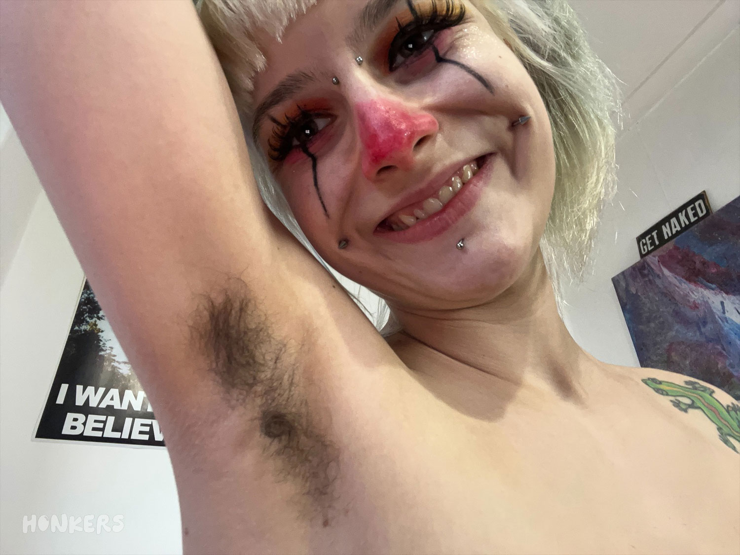 Cute clowngirl shows you her hairy armpit