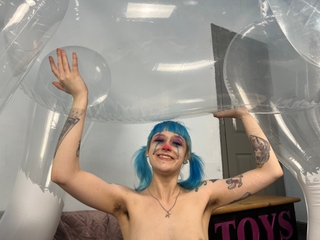 Clown Rides Inflatable Horse